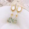 Oval Nacre Top Dried Flower Resin Teardrop Earrings